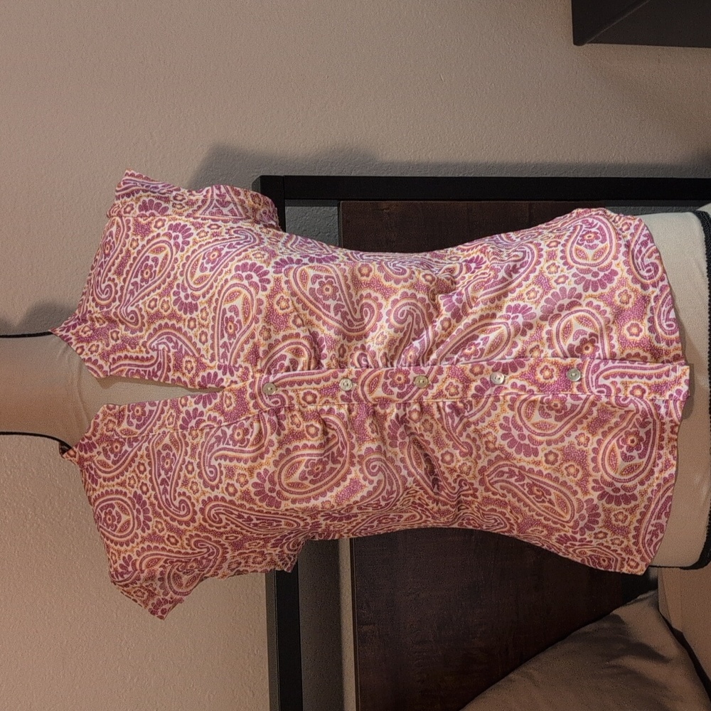 Beautiful Paisley purple, orange and cream colored.